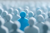 Blue figure standing out among crowd of white figures, representing individuality, leadership, and uniqueness in business or social environment.