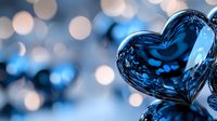 Romantic glass heart with blue reflections and bokeh lights in background creates dreamy atmosphere for Valentine's Day cards and love concepts.