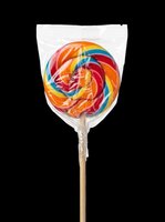 Colorful swirled lollipop with rainbow stripes isolated on transparent background, ready for clipart, t-shirt designs, stickers, and print-on-demand products.