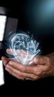 Male hands holding glowing holographic clock with Roman numerals and handprint symbol, representing time management, digital technology, and future innovation for business concepts.