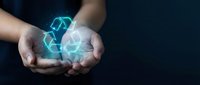 Hands holding glowing digital brain hologram with neural network connections on dark background, representing artificial intelligence, technology innovation, and future computing solutions.