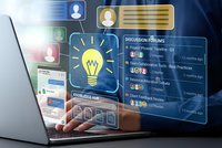 Digital innovation concept with glowing lightbulb icon and interface elements floating above laptop screen for technology and business solutions.