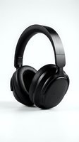 Black wireless headphones with padded ear cups and adjustable headband isolated on white background, suitable for audio equipment advertising and tech product design.