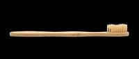 Wooden toothbrush with natural bristles isolated on transparent background, ready for clipart, t-shirt design, print-on-demand products, stickers, and sublimation projects.