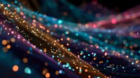Vibrant abstract background with colorful bokeh lights in blue, gold, and purple creating dynamic flowing lines for festive designs.