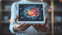Person holding digital tablet displaying colorful brain visualization with data icons and neural network connections on screen against blurred bookshelf background.