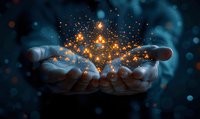 Magical glowing golden sparkles and light particles floating above cupped hands against dark blue background, creating mystical atmospheric scene for fantasy concepts.