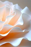 Delicate peach and white rose petals in macro photography showing soft curves and gentle folds with dreamy lighting creating romantic mood for wedding designs.