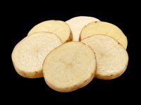Fresh raw potato slices arranged in a fan pattern, isolated on transparent background, ready for food design, stickers, print on demand, and T-shirt clipart use.