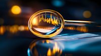 Magnifying glass revealing financial chart data with golden bokeh lights and reflective surface for business analysis and market research presentations.
