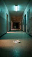 Abandoned hospital corridor with flickering fluorescent light and a crumpled sorry note on the floor, evoking mystery and dread.