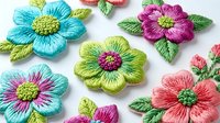 Colorful embroidered flowers with green leaves on white background, isolated design elements suitable for textile crafts, patches, and decorative applications.