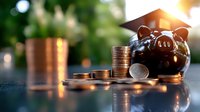 Black ceramic piggy bank wearing graduation cap next to stacked coins on reflective surface, symbolizing education savings and financial planning for college.