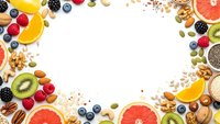 Colorful healthy food frame with fresh fruits, nuts, seeds and berries on white background. Nutritious organic ingredients for balanced diet and wellness.