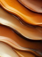 Smooth flowing caramel waves with golden and bronze tones create an elegant abstract background for luxury product marketing.