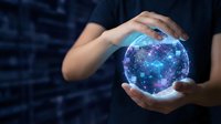 Hands protecting glowing digital network sphere with connected nodes and data visualization for technology and cybersecurity concepts.