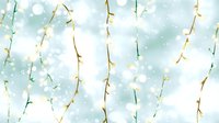 Glowing string lights cascading against soft blue winter background with bokeh effect and falling snow creates magical holiday atmosphere.