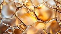 Golden honeycomb macro structure with transparent cells filled with honey, showing natural geometric pattern and light reflections. For food packaging and wellness designs.