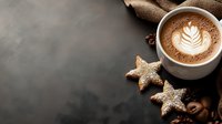 Hot cappuccino with latte art foam and star-shaped cookies dusted with powdered sugar on dark rustic background, cozy winter coffee break setting.