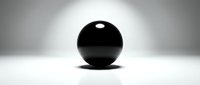 Black sphere with glossy surface and highlight reflection on white background creating dramatic lighting and shadow effects for modern design projects.
