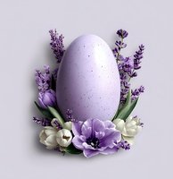 Large purple Easter egg decorated with lavender sprigs, white and purple anemone flowers on soft purple background. Elegant spring holiday composition.