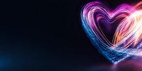 Glowing neon heart shape created with light trails in pink and blue colors against dark background, romantic abstract Valentine banner with copy space.