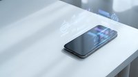 Modern smartphone with holographic security icons floating above screen displaying digital protection and cybersecurity technology on white surface.