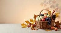 Autumn harvest basket with pumpkins, grapes, apples and colorful fall leaves on neutral background for seasonal decoration and thanksgiving concepts.