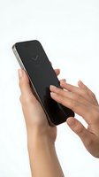 Female hands with manicured nails holding smartphone with black screen displaying clock icon against white background. Isolated on white for app design, technology marketing, mobile device promotion.