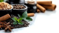 Aromatic spices and herbs arrangement with cinnamon sticks, star anise, brown sugar, black pepper, and fresh mint leaves on dark background for cooking and seasoning.