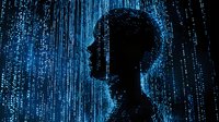 Silhouette of male profile against glowing blue digital rain background with streaming binary code pattern, representing artificial intelligence and technology.