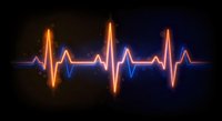 Glowing neon heartbeat pulse wave with orange and blue light effects on dark background for medical healthcare technology design projects.