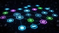 Glowing hexagonal network nodes with colorful neon lights creating futuristic digital connectivity pattern on dark background for technology designs.