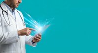 Male doctor using digital tablet with glowing light effects on turquoise background for healthcare technology and medical innovation concepts.