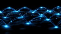 Glowing blue network connections with light nodes forming an interconnected web pattern against dark background, representing digital communication technology.