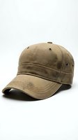 Khaki blank baseball cap isolated on white background, unstructured cotton twill hat with curved brim, eyelets, and stitching detail for mockup use.