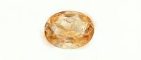Faceted golden topaz gemstone isolated on white background, suitable for jewelry design, luxury branding, and e-commerce product displays.