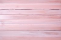 Soft pink wooden planks background with natural grain texture and horizontal lines creating rustic shabby chic surface for design projects and mockups.