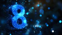 Glowing blue number eight formed by luminous particles against dark background with bokeh light effects.