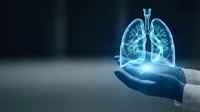 Medical professional holding glowing blue lungs hologram for respiratory health care and pulmonary medicine concept with digital technology visualization.