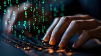 African American woman hands typing on keyboard with digital matrix code overlay in green, creating cybersecurity and programming concept for tech industry use.