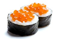 Fresh salmon roe sushi rolls with bright orange caviar and white rice wrapped in dark nori seaweed, isolated on white background for menu design.