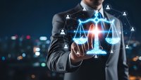 Professional businessman touching digital justice scales with network connections representing legal technology and law firm services in modern office.