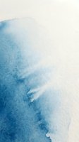 Abstract blue watercolor wash with soft gradient transitions from deep azure to white creating organic flowing texture for artistic backgrounds.
