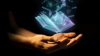 Digital knowledge concept with glowing holographic book floating above cupped hands showing data visualization and futuristic learning technology.