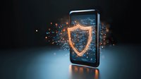 Glowing shield emerging from smartphone screen with digital particles, representing mobile security and data protection in dark background with blue lighting.