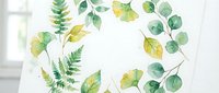 Watercolor botanical wreath with green ferns and eucalyptus leaves on transparent background, isolated for wedding invitations and nature designs.