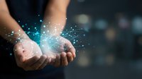 Hands holding glowing digital globe with network connections and data streams, representing global technology, innovation, and digital transformation for business solutions.