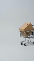 Cardboard boxes stacked in shopping cart against white background, representing e-commerce, online shopping, delivery service, and retail logistics for business and marketing.