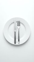Empty white plate with knife and fork placed symmetrically on white surface, overhead view. Minimalist dining setup for restaurant, catering, menu design.